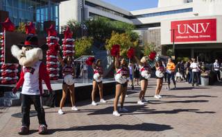 Hey Reb! and UNLV cheerleaders perform during a campus spirit rally for the inaugural Rebels Give fundraising challenge in front of the Student Union building at UNLV in Las Vegas on Thursday, Oct. 11, 2018.