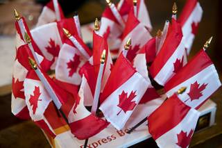 Canadian flags are displayed at the Cheba Hut restaurant during a celebration of Canada's marijuana legalization Wednesday, Oct. 17, 2018. Recreational marijuana became legal in Canada Wednesday.