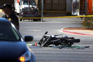 A motorcycle accident is shown on Nellis Boulevard, north of Stewart Avenue, after a fatal accident Thursday, Oct. 18, 2018.