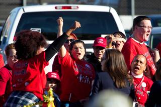 Members of the Culinary Workers Union cheer during a Nevada Democratic Party rally at union headquarters, Sat. Oct, 20, 2018.