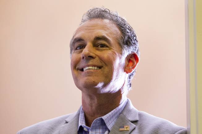 Danny Tarkanian reacts as Sen. Lindsey Graham's, R-S.C., speaks during a campaign office event, Friday, Oct. 26, 2018.