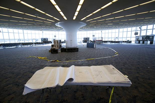 Renovation plans are shown on a table in an A-Gates cluster building at McCarran International Airport Thursday, Nov. 1, 2018.