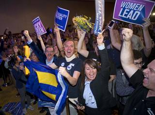 Democrats cheer election returns during a Nevada Democrats election night party at Caesars Palace Tuesday, Nov. 6, 2018. 