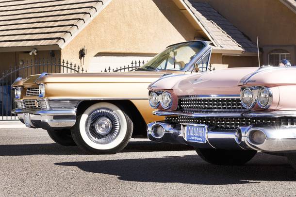 Pictured are a 1964 Gold Palomino convertible and 1959 Pink Cadillac with fins from the Cadillac Club, Wed. Oct. 24, 2018. (Wade Vandervort, Las Vegas Sun)