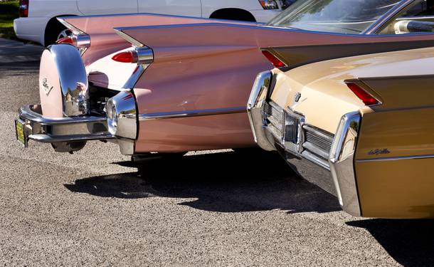 Pictured are a 1964 Gold Palomino convertible and 1959 Pink Cadillac with fins from the Cadillac Club, Wed. Oct. 24, 2018. (Wade Vandervort, Las Vegas Sun)
