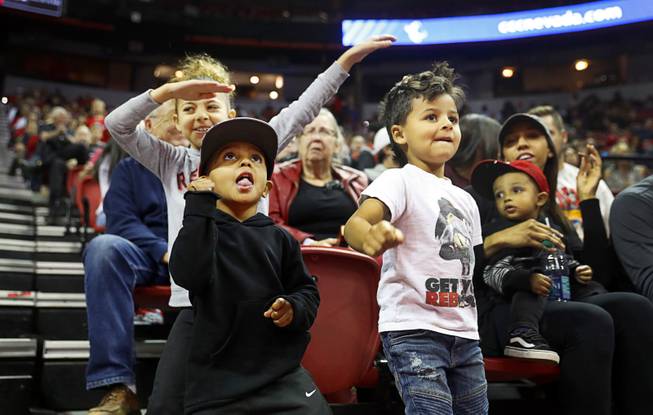 Young Rebe fans dance as the UNLV Runnin' Rebels take on the Loyola Marymount Lions during a game at the Thomas & Mack Center Saturday, Nov. 10, 2018.