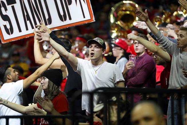 Fans cheer as the UNLV Runnin' Rebels take on the Loyola Marymount Lions during a game at the Thomas & Mack Center Saturday, Nov. 10, 2018.