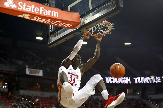 UNLV forward Cheikh Mbacke Diong dunks against the Loyola Marymount Lions at the Thomas & Mack Center, Saturday, Nov. 10, 2018.