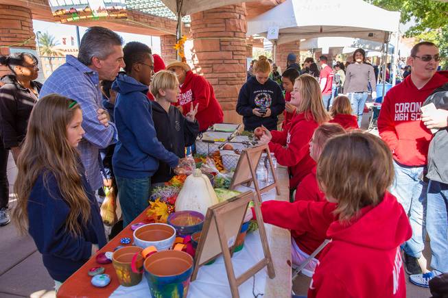 Students at Coronado High School participate in the Biannual Student Farmers Market at the Clark County Government Center, selling fruits and vegitables that are grown in school gardens, Thursday Nov. 8, 2018.