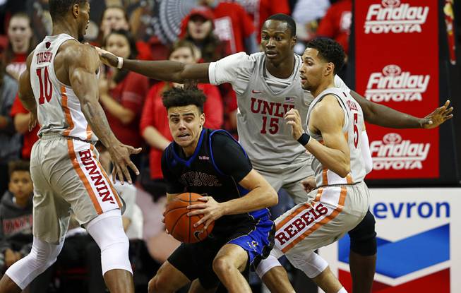 UC Riverside Highlanders guard Dikymbe Martin (15) gets shut down under the basket during a game against UNLV at the Thomas & Mack Center Tuesday, Nov. 13, 2018.
