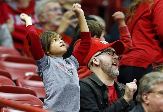 Fan cheer for UNLV during a game against UC Riverside at the Thomas & Mack Center Tuesday, Nov. 13, 2018.