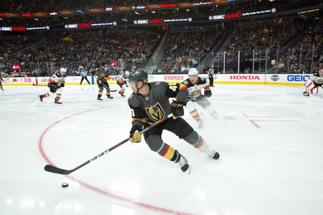 Golden Knights' Reilly Ryan Carpenter handles the puck in the second period of their game against the Anaheim Ducks at T-Mobile Arena, Wed. Nov. 14, 2018.