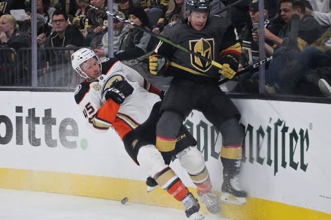 Anaheim's Andy Welinski and Golden Knights' Jonathan Marchessault collide during the second period of their game at T-Mobile Arena, Wed. Nov. 14, 2018.