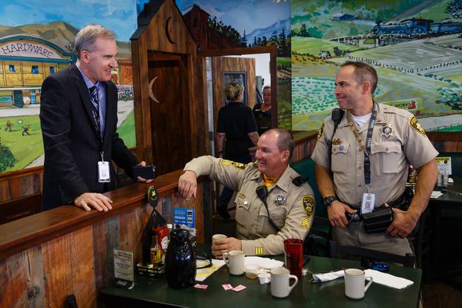From left, Officer Steven Crupi, Sgt. Peter Quinn and Lt. Frank Fama talk during a meet and greet event called Coffee with a Cop hosted by the Las Vegas Metropolitan Police Department at the Egg & I, Wednesday, Nov. 14, 2018.