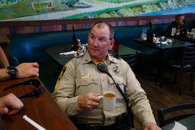 Traffic Sgt. Peter Quinn talks with fellow officers during a meet and greet event called Coffee with a Cop hosted by the Las Vegas Metropolitan Police Department at the Egg & I, Wednesday, Nov. 14, 2018.