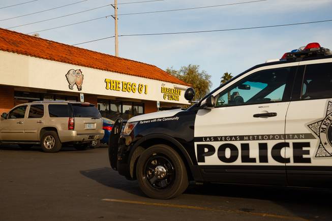 A police car is seen in a parking lot during a meet and greet event called Coffee with a Cop hosted by the Las Vegas Metropolitan Police Department at the Egg & I, Wednesday, Nov. 14, 2018.