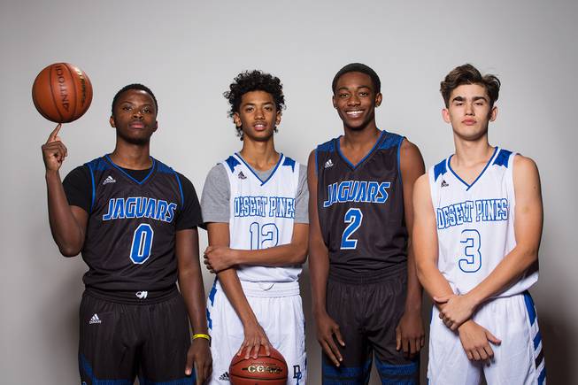 Players of the Desert Pines High basketball team, from left, AJ Pullins, Milos Uzan, Deshawn Wiley and Cimarron Conriguez take a portrait during the Las Vegas Sun's Media Day at Red Rock Resort and Casino on Oct. 30, 2018.