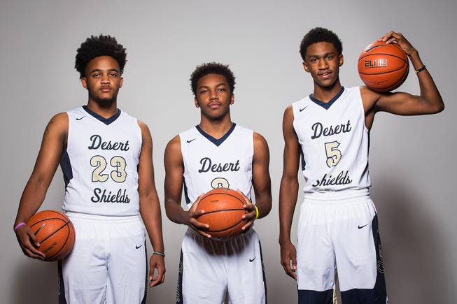 Players of the Cheyenne High basketball team, from left, Damion Bonty, JD McCormick and Glenn Taylor Jr. take a portrait during the Las Vegas Sun's Media Day at Red Rock Resort and Casino on Oct. 30, 2018.