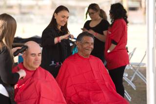 Volunteers give haircuts to those who are homeless or at risk of becoming homeless during Project Homeless Connect, Tuesday, Nov. 20, 2018. The project brings several resources and organizations together in one location to help those in need.