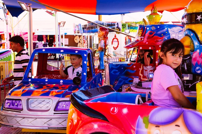 Children enjoy carnival rides at Broadacres Marketplace in North Las Vegas, Sunday, Sept. 9, 2018.