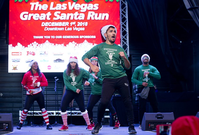 Zumba instructors from the YMCA of Southern Nevada give runners ...