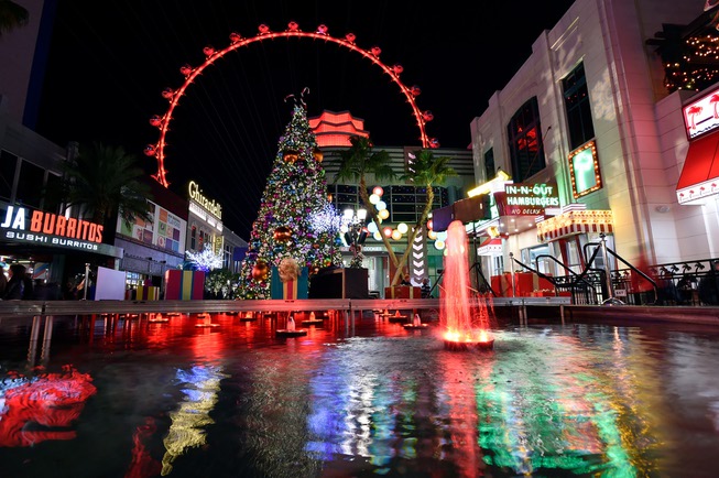The High Roller is seen over the holiday display at ...