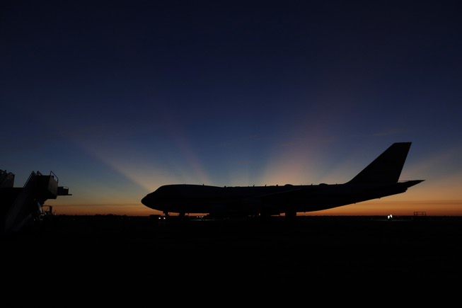 The sun rises behind Special Air Mission 41, the plane ...