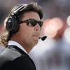Oklahoma State head coach Mike Gundy keeps a eye on the scoreboard during the first half of an NCAA college football game against Kansas State in Manhattan, Kan., Saturday, Oct. 13, 2018.