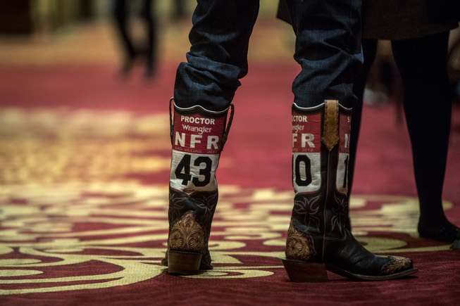 Guests enjoy the Professional Rodeo Cowboys Association's welcome reception on ...