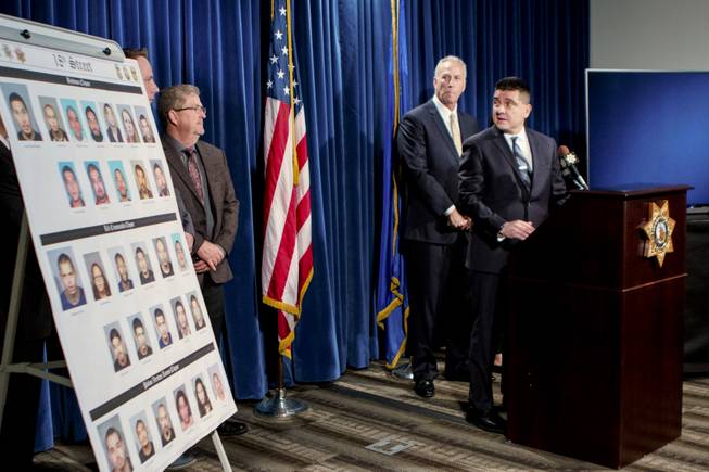 Metro Police gang and vice Capt. John Leon, right, and Clark County District Attorney Steve Wolfson, second to far right, address reporters on Dec. 5, 2018, regarding arrests in an operation that targeted the 18th Street transnational gang in the Las Vegas Valley. 