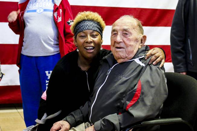 Joe Rosa poses with Jacquie Cottey at 24 Hour Fitness in Summerlin in celebration of his 103rd birthday on Friday, Dec. 7, 2018. 