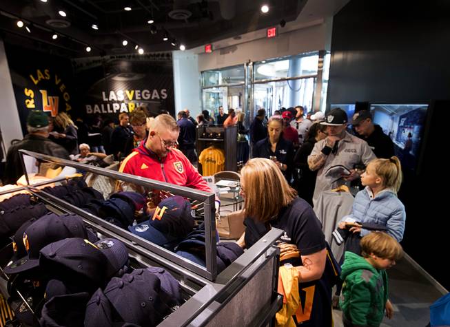 Fans shop for merchandise at the Las Vegas Ballpark store after the unveiling of a new name for the Las Vegas Triple-A baseball team in Downtown Summerlin Saturday, Dec. 8, 2018. The team, formerly known as the Las Vegas 51s, will now be called the Aviators.