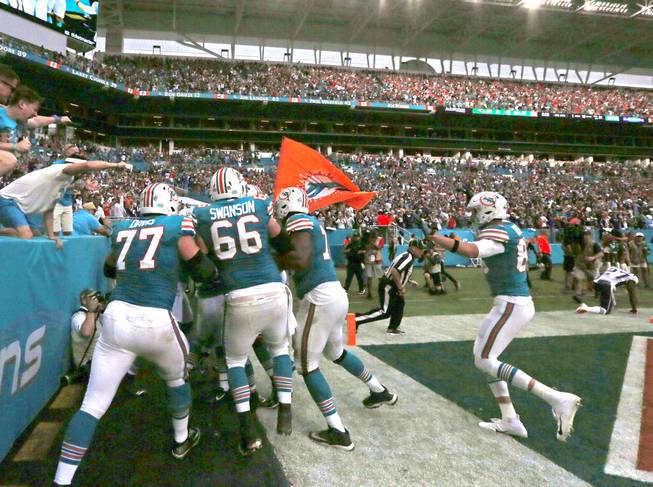 Dolphins beat Pats on miracle