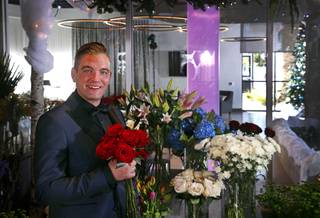 Owner Steven Stewart-Clark poses at Stinko's, a florist and events business in the Arts District, 1029 S. Main St., Wednesday, Dec. 12, 2018.