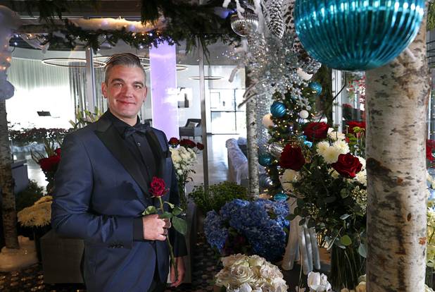 Steven Stewart-Clark poses at Stinko's, a florist and events business in the Arts District, 1029 S. Main St., Wednesday, Dec. 12, 2018.