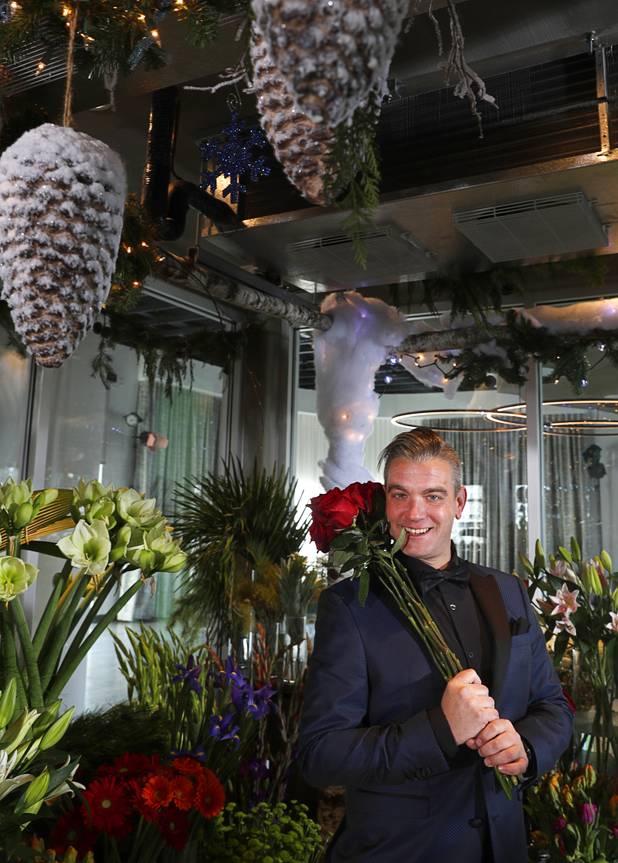 Steven Stewart-Clark poses at Stinko's, a florist and events business in the Arts District, 1029 S. Main St., Wednesday, Dec. 12, 2018.