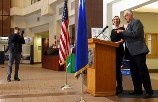 Governor-elect Steve Sisolak shares the podium with Heather Korbulic, executive director of Silver State Health Insurance Exchange, during a news conference on health insurance at the Sawyer State Building Friday, Dec. 14, 2018. The deadline for enrolling for health insurance through Nevada Health Link (www.nevadahealthlink.com) is midnight Saturday, Dec. 15.