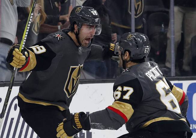 Vegas Golden Knights right wing Alex Tuch, left, (89) celebrates ...