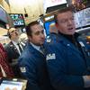 Stock traders work at the New York Stock Exchange, Wednesday, Dec. 19, 2018.