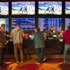 In this Thursday, Dec. 13, 2018, file photo, gamblers place bets in the temporary sports betting area at the SugarHouse Casino in Philadelphia. The federal government would regulate sports betting nationwide under a bill to be introduced Wednesday, Jan. 19,2018. The bill would have the U.S. Justice Department set minimum standards states must meet in order to offer sports betting, but denies the sports leagues the so-called “integrity fees” they have been seeking in new legislation, essentially a cut of sport betting revenue.