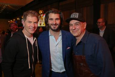 Bobby Flay, Palms general manager Jon Gray and Michael Symon celebrate the opening of Mabel’s BBQ on December 18.