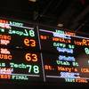 This Nov. 20, 2018, file photo shows a scrolling video board with basketball scores reflected in the ceiling of the new sports book at Resorts Casino in Atlantic City, N.J.