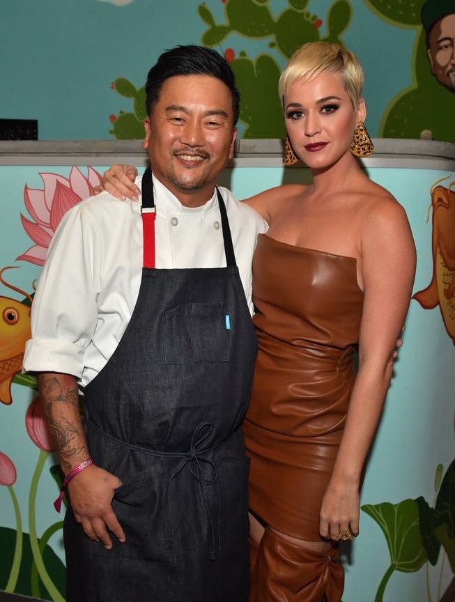 Chef Roy Choi welcomes Katy Perry to his Best Friend restaurant during Park MGM's grand opening weekend.