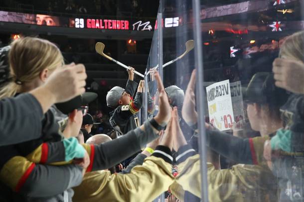 A young Golden Knights fan receives at hockey stick from Marc-Andre Fleury at the end of their game against the New York Rangers at T-Mobile Arena, Tues. Jan 8, 2019. Vegas beat New York 4-2.