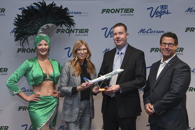 From left, Frontier Airlines Vice President of Marketing Tyri Squyres, ...