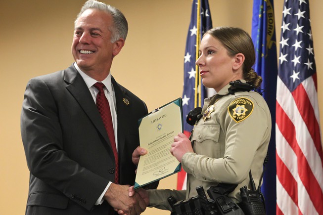 Las Vegas Sheriff Joe Lombardo presents LVMPD Officer Nicolette Hawkins ...