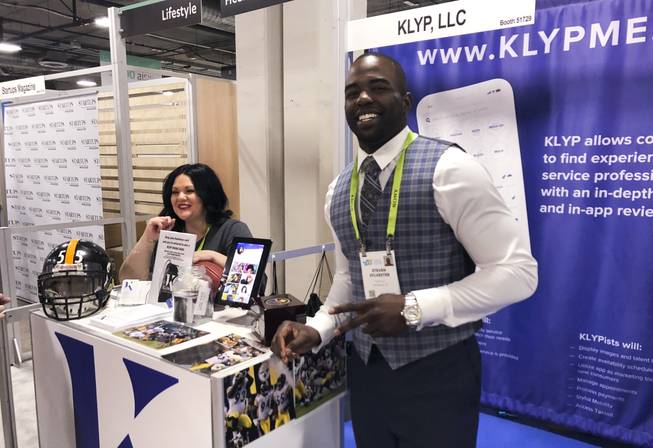 Steven Sylvester at his booth for his Klyp app for hair professionals.