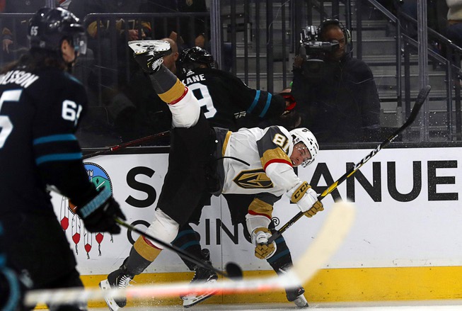 Vegas Golden Knights center Jonathan Marchessault (81) is upended by ...
