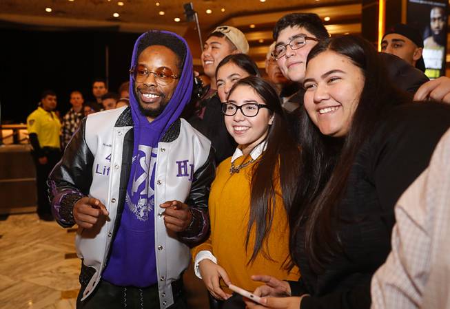 Bantamweight boxer Rau'shee Warren poses with fans in the MGM Grand lobby in Las Vegas Tuesday, Jan 15, 2019. Warren will face Nordine Oubaali of France for a vacant WBC title at the MGM Grand Garden Arena on Saturday.