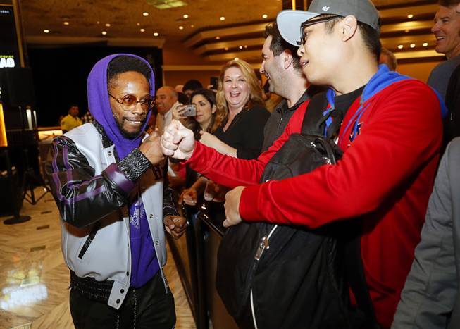 Bantamweight boxer Rau'shee Warren fist bumps with a fan in the MGM Grand lobby in Las Vegas Tuesday, Jan 15, 2019. Warren will face Nordine Oubaali of France for a vacant WBC title at the MGM Grand Garden Arena on Saturday.